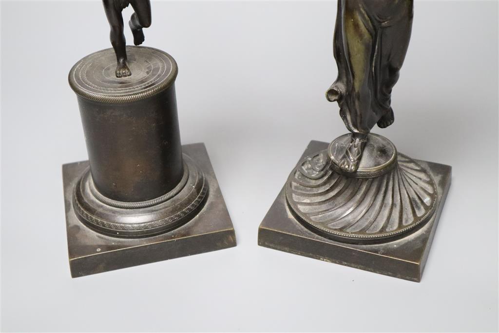 Two early 19th century bronze figural candlesticks (lacking glass lustres), 37.5cm